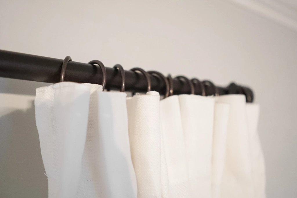 Change the Length of a Shower Curtain With These Alternatives to Rings and  Hooks